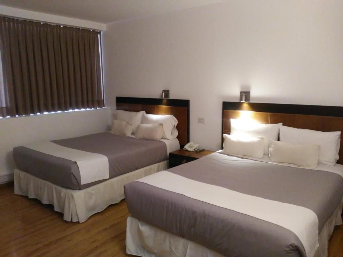 Global Hotel Centenario Bagian luar foto