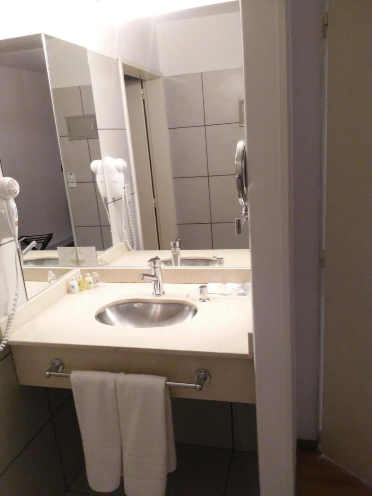 Global Hotel Centenario Bagian luar foto