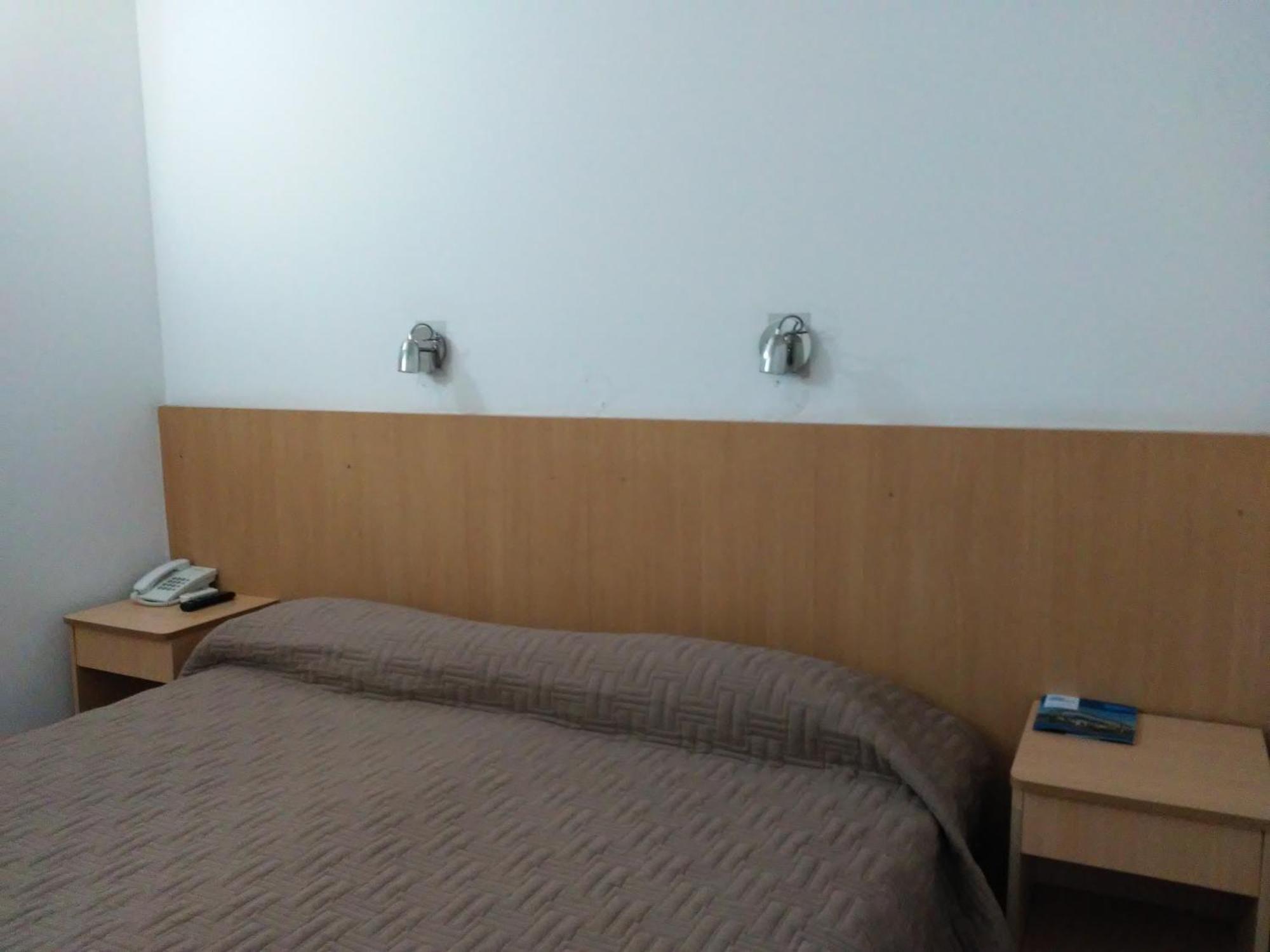 Global Hotel Centenario Bagian luar foto