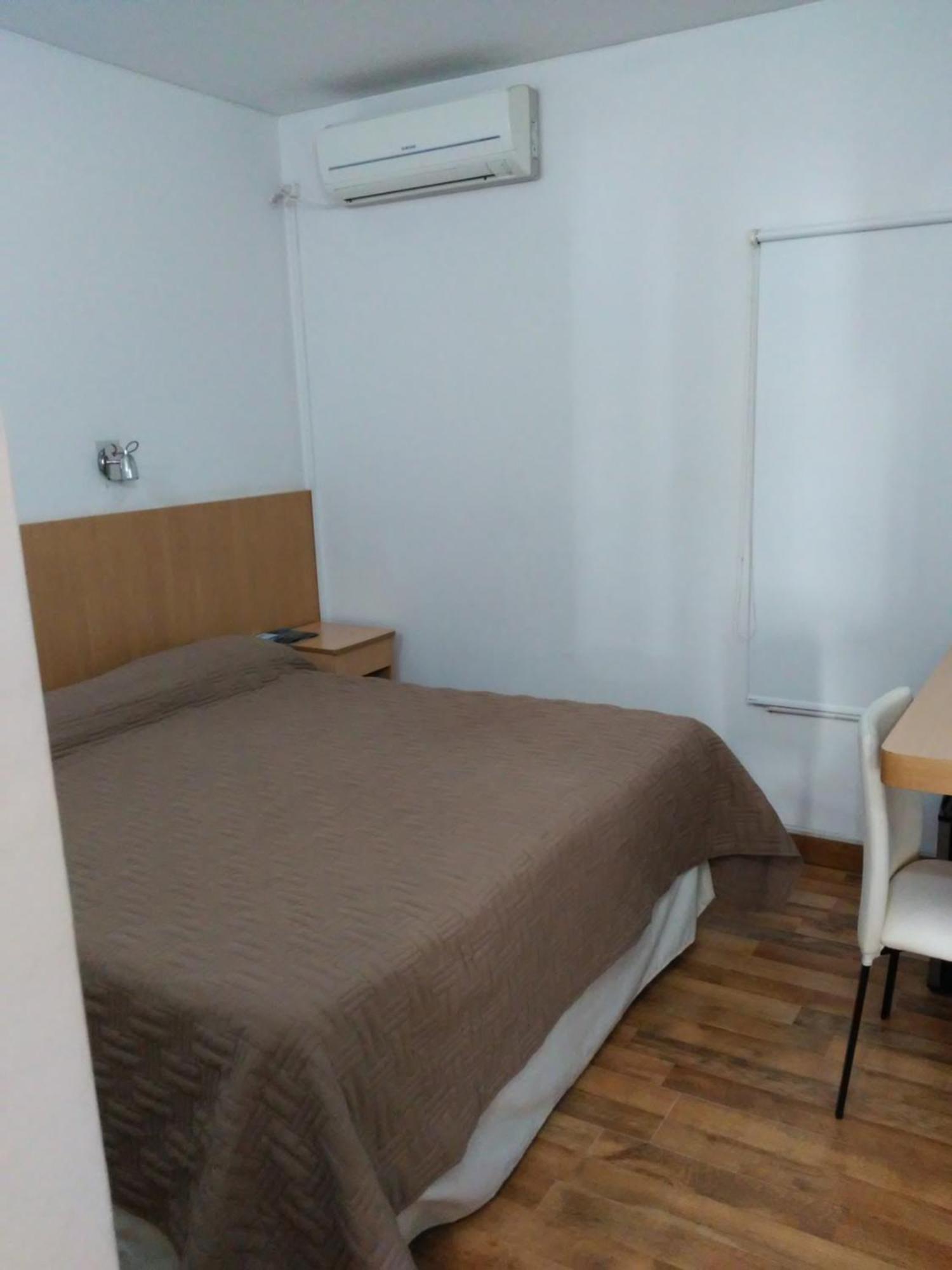 Global Hotel Centenario Bagian luar foto