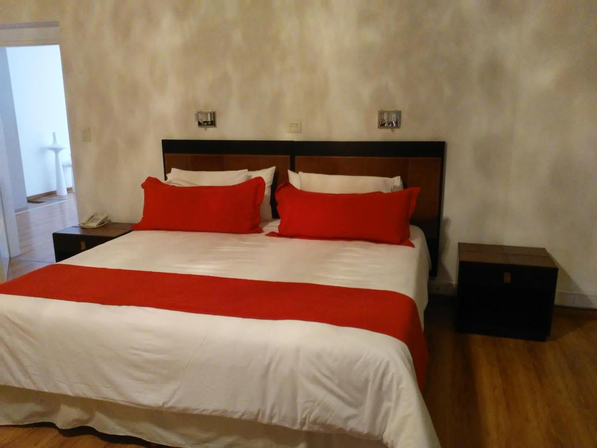 Global Hotel Centenario Bagian luar foto