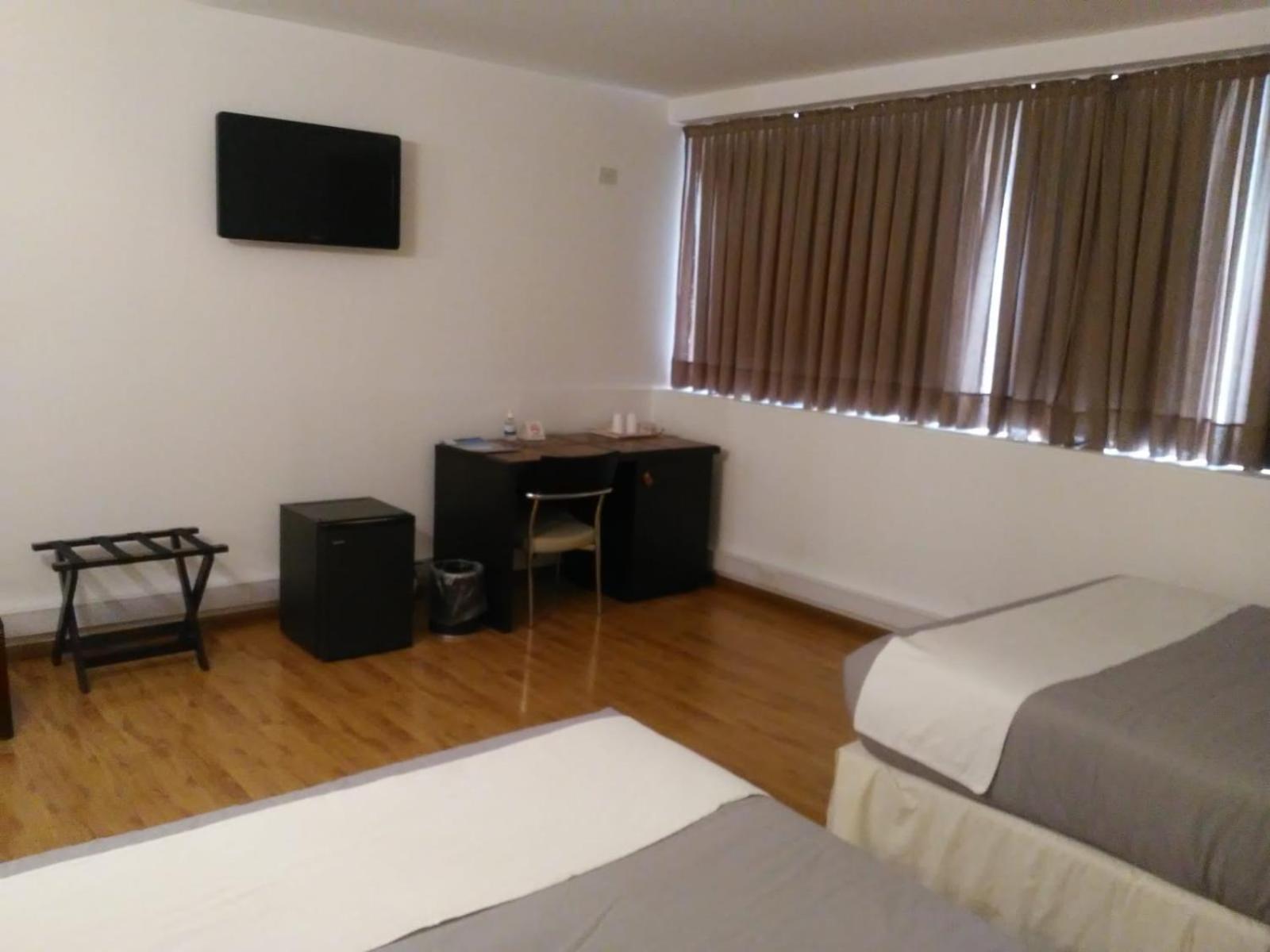 Global Hotel Centenario Bagian luar foto